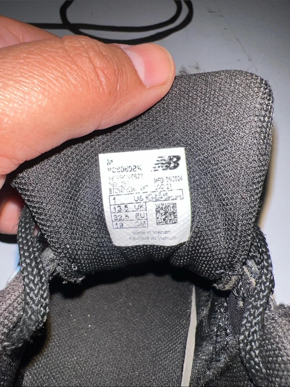 New Balance Kids Black and Gray Trail-Style Sneakers